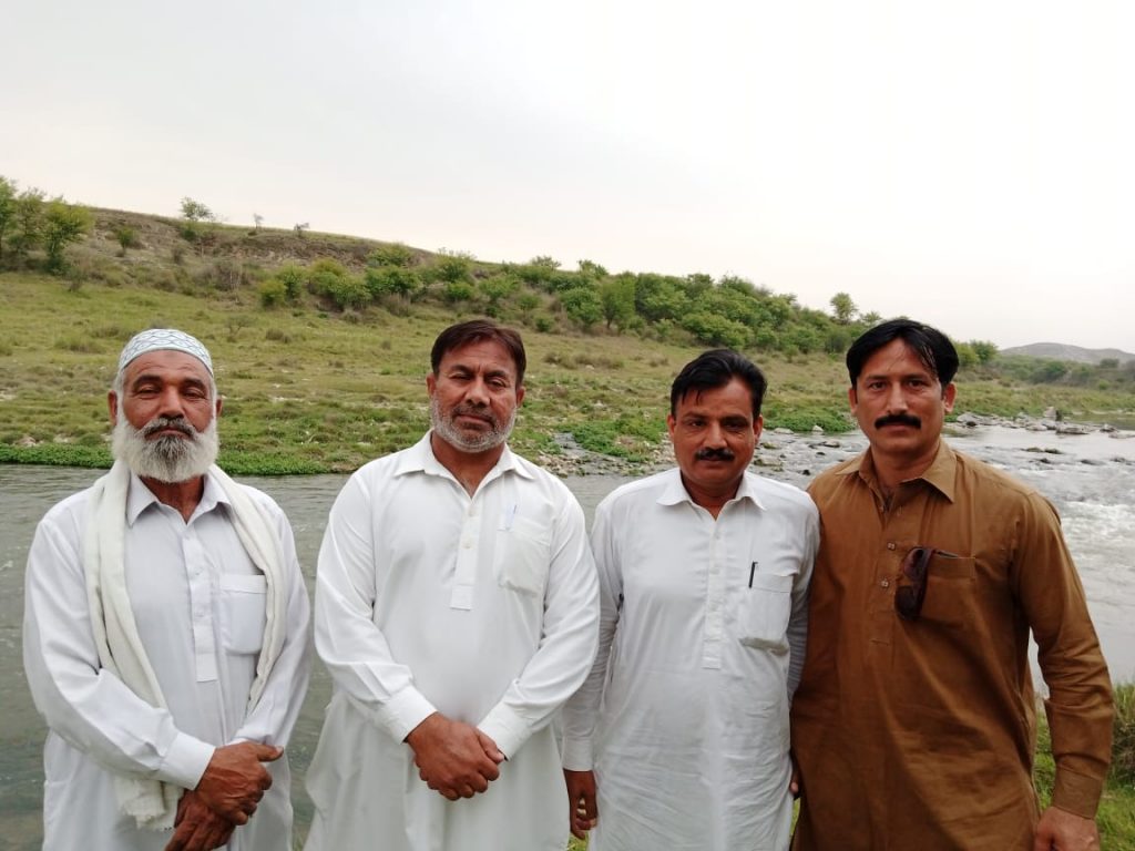 poets sitting in sanjwali village